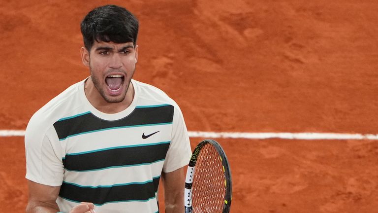 Spain's Carlos Alcaraz reacts as he plays against Italy's Lorenzo Musetti during their semifinal match of the French Tennis Open at the Roland-Garros stadium in Paris, Friday, June 6, 2025. (AP Photo/Lindsey Wasson)