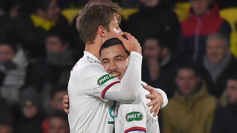 Rayan Cherki celebrates with Joachim Andersen after scoring for Lyon against Nantes in 2020