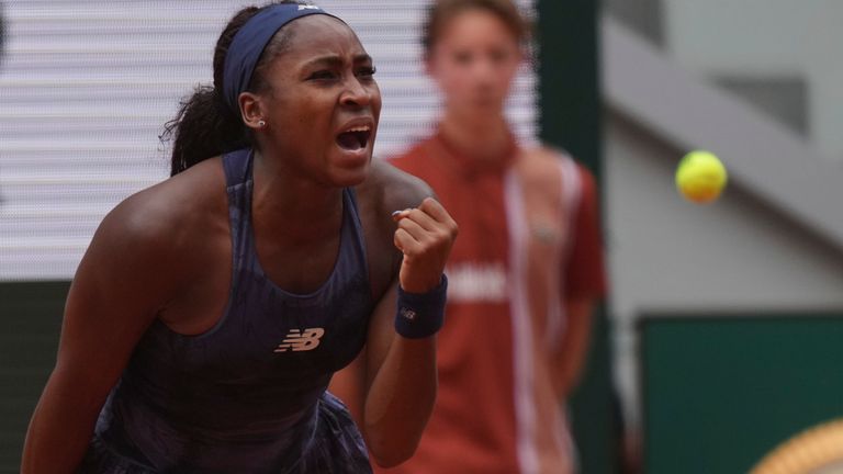 Coco Gauff of the U.S. celebrates as she won the fourth round match of the French Tennis Open against Russia's Ekaterina Alexandrova at the 