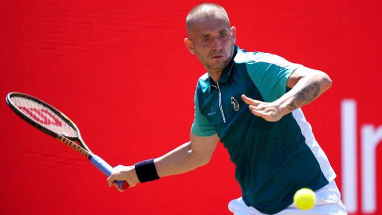 Dan Evans in action against Frances Tiafoe in their Men's Singles match on day eight of the HSBC Championships at The Queen's Club