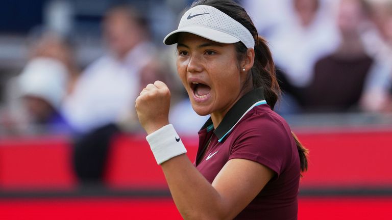 Britain's Emma Raducanu celebrates winning a point against Spain's Crista Bucsa during her women's singles match at the Queens Club grass court tennis championships in London, Tuesday, June 10, 2025. (AP Photo/Joanna Chan)