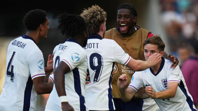 England's Harvey Elliott celebrates with teammates after scoring his side's second goal during the semi final soccer match between England and the Netherlands at the European U-21 Championship at the National football stadium in Bratislava, Slovakia, Wednesday, June 25, 2025. (AP Photo/Petr David Josek)