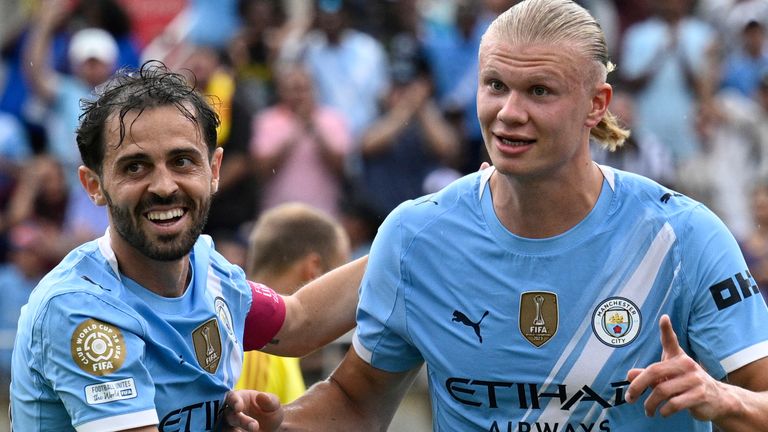 Erling Haaland, right, celebrates with Bernardo Silva after scoring Man City's third goal during the Club World Cup match with Juventus 