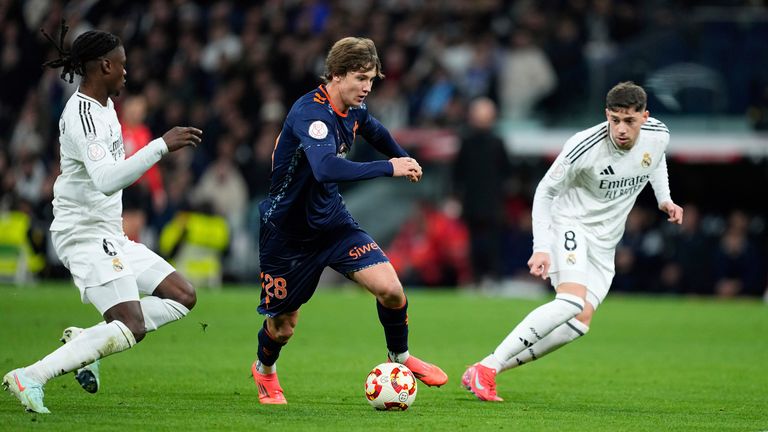 Fer Lopez of Celta de Vigo and Eduardo Camavinga of Real Madrid in action during the Spanish Cup, Copa del Rey, round of 16 football match played between Real Madrid and RC Celta de Vigo at Santiago Bernabeu stadium on January 16, 2025, in Madrid, Spain. AFP7 16/01/2025 (Europa Press via AP)