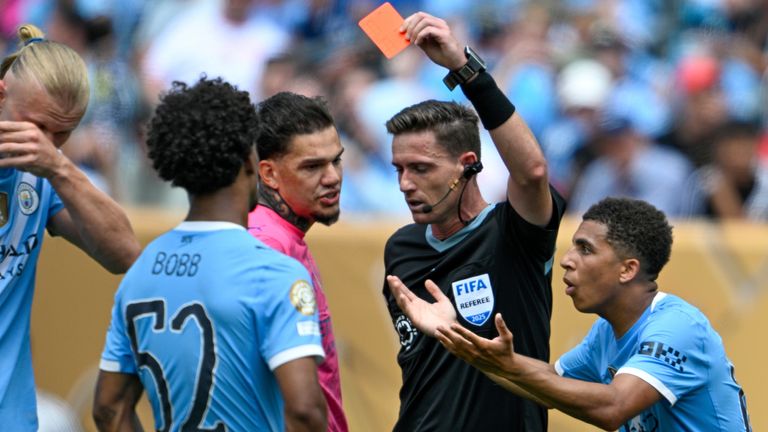 Manchester City defender Rico Lewis is shown a red card during the Club World Cup match against Wydad AC