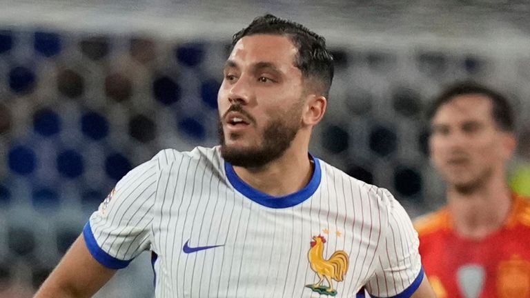 France's Rayan Cherki, right, runs after scoring during the Nations League semifinal soccer match between Spain and France in Stuttgart