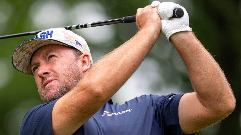 Graeme McDowell of Smash GC hits his shot from the 15th tee during the final round of LIV Golf Virginia at Robert Trent Jones Golf Club