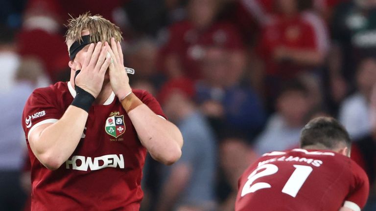 Lions' Henry Pollock, centre, reacts after his side were defeated in the Rugby Union international match between the British and Irish Lions and Argentina, at the Aviva Stadium in Dublin, Friday, June 20, 2025. (AP Photo/Peter Morrison)