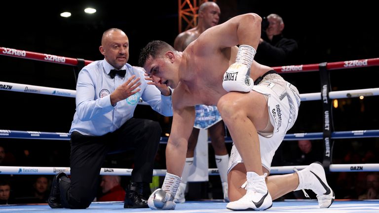 Justis Huni is counted out by referee John Latham as Fabio Wardley wins