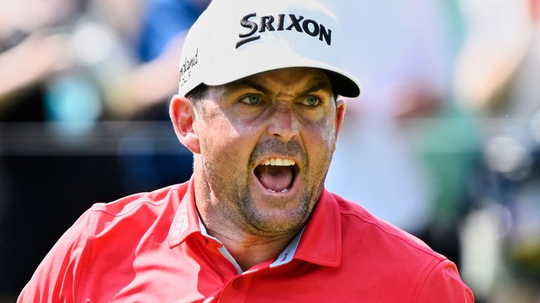 Keegan Bradley reacts to making birdie putt to a tie for the lead on the ninth hole during the final round of the Travelers Championship golf tournament at TPC River Highlands, Sunday, June 22, 2025, in Cromwell, Conn. (AP Photo/Jessica Hill)