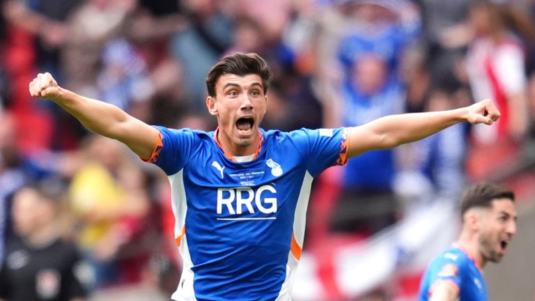 Kian Harratt's 112th-minute winner sealed Oldham's return to the EFL after three seasons away
