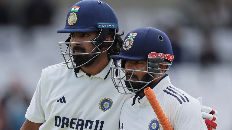 India's Rishabh Pant, right, celebrates with batting partner KL Rahul after scoring a century on day four of the first cricket test match between England and India at Headingley in Leeds, England, Monday, June 23, 2025. (AP Photo/Scott Heppell)