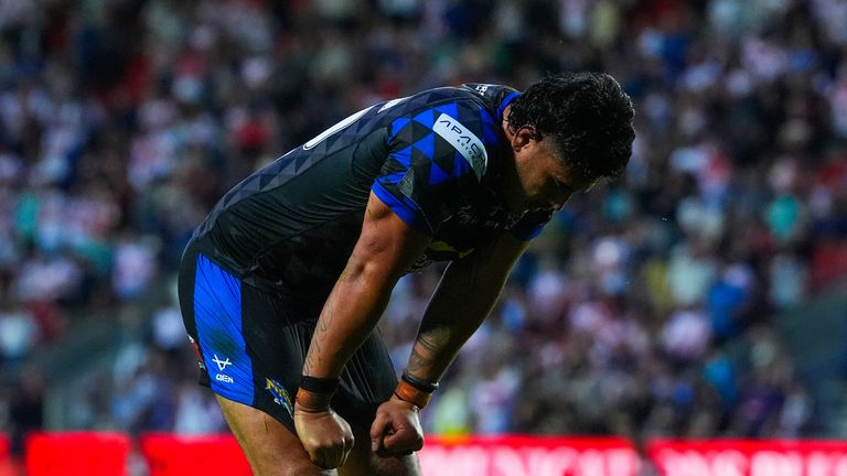 Picture by Olly Hassell/SWpix.com - 20/06/2025 - Rugby League - Betfred Super League Round 15 - St Helens v Leeds Rhinos - The Totally Wicked Stadium, St Helens, England - Keenan Palasia of Leeds looks dejected after their teams loss against St Helens