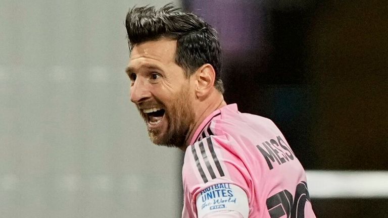 Inter Miami's Lionel Messi, right, celebrates after scoring his side's second goal 