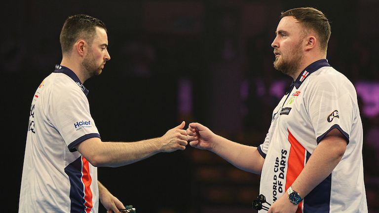 Luke Humphries fist pumps Luke Littler at the World Cup of Darts (Jenny Segers, PDC Europe)