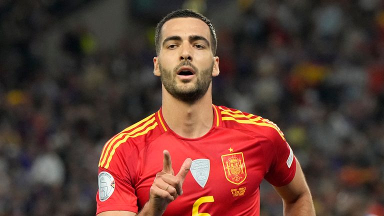 Spain's Mikel Merino celebrates after scoring his side's second goal against France during the Nations League semifinal soccer match