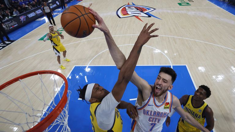 Oklahoma City Thunder forward Chet Holmgren (7) dunks against the Indiana Pacers during the second half of Game 5 of the NBA Finals basketball series, Monday, June 16, 2025, in Indianapolis. (Matthew Stockman/Pool Photo via AP)