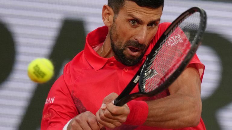 Serbian Novak Djokovic plays a goal against German Alexander Zverev during their quarterfinal match of the French tennis Open at Roland-Gerros Stadium in Paris, Wednesday, June 4, 2025 (AP Photo/Aurelien Morissard)