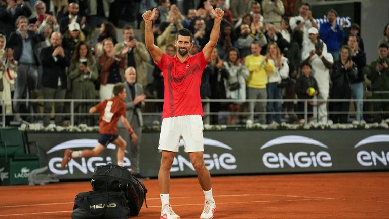 Serbia's Novak Djokovic gestures as he leaves the semifinal match of the French Tennis Open against Italy's Jannik Sinner at the Roland-Garr
