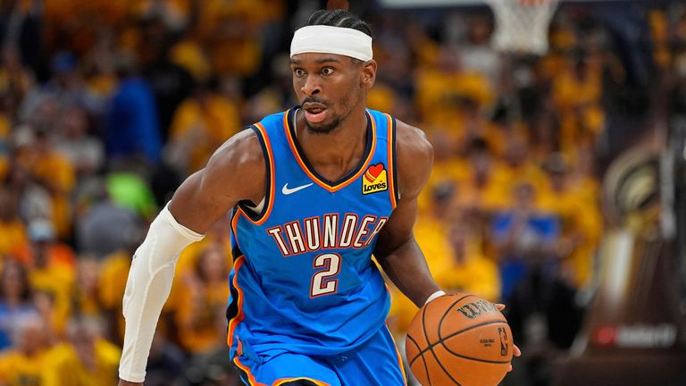 Oklahoma City Thunder guard Shai Gilgeous-Alexander (2) moves the ball up court against the Indiana Pacers during the second half of Game 6 