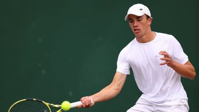 Oliver Tarvet in action on the new day of Wimbledon at Tennis All England Lawn and at the Croquet Club, Wimbledon. Image date: Wednesday July 7