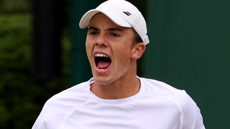 Oliver Tarvet of Great Britain celebrates during his boys' singles first-round match against Viacheslav Bielinsky
