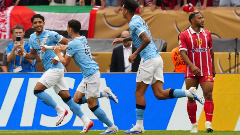 Manchester City players celebrate opening goal by Phil Foden, center,  during the Club World Cup group G soccer match between Manchester City and Wydad AC in Philadelphia, Wednesday, June 18, 2025. (AP Photo/Derik Hamilton)