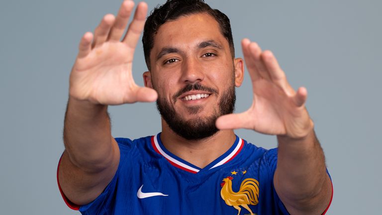 Rayan Cherki poses for photos ahead of the Nations League finals with France