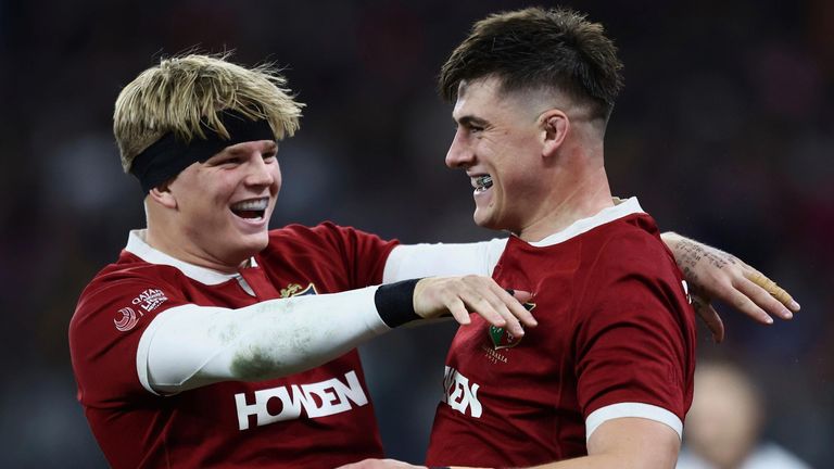 Dan Sheehan is congratulated by team-mate Henry Pollock after scoring the Lions' opening try against Western Force