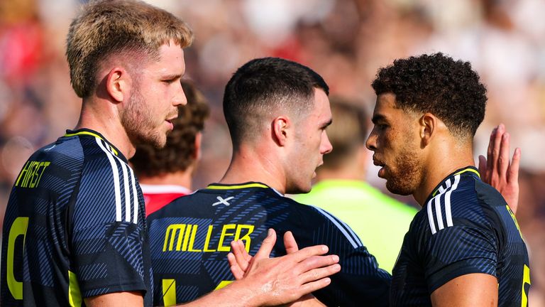 VADUZ, LIECHTENSTEIN - JUNE 08: Scotland's Che Adams (R) celebrates scoring to make it 2-0 with teammate George Hirst during an International Friendly match between Liechtenstein and Scotland at Rheinpark Stadion, on June 08, 2025, in Vaduz, Liechtenstein. (Photo by Craig Williamson / SNS Group)