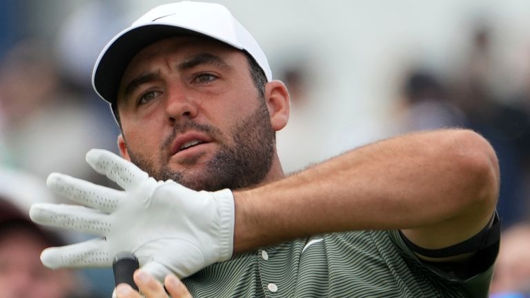 Scottie Scheffler reacts to his tee shot on the 15th hole during the second round of the U.S. Open golf tournament at Oakmont Country Club Friday, June 13, 2025, in Oakmont, Pa. (AP Photo/Gene J. Puskar)