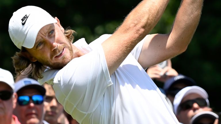 Tommy Fleetwood, from England, hits from the first tee during the final round of the Travelers Championship golf tournament at TPC River Highlands, Sunday, June 22, 2025, in Cromwell, Conn. (AP Photo/Jessica Hill)