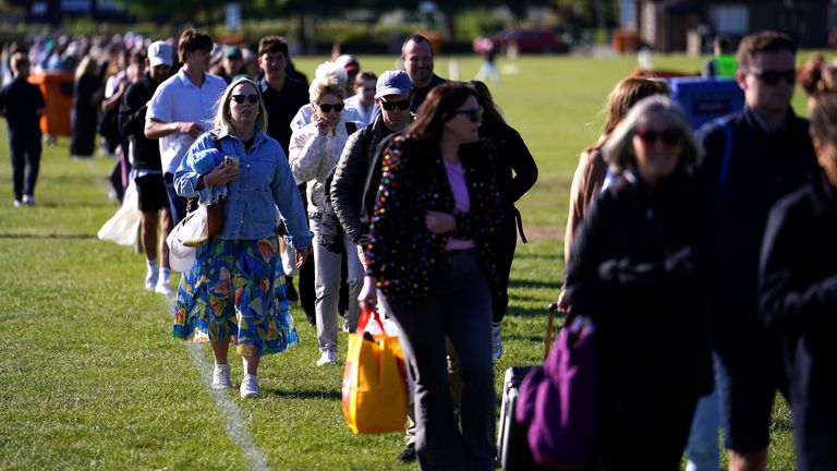 Spectators in the queue on day one of the 2024 Wimbledon Championships at the All England Lawn Tennis and Croquet Club, London. Picture date
