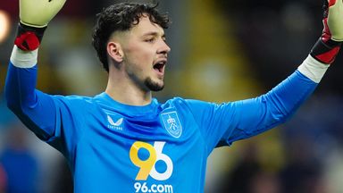 Burnley goalkeeper James Trafford holds up both hands while playing in a Championship match at Turf Moor in January, 2025