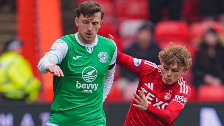 ABERDEEN, SCOTLAND - APRIL 26: Hibernian's Josh Campbell and Aberdeen's Leighton Clarkson in action during a William Hill Premiership match between Aberdeen and Hibernian at Pittodrie, on April 26, 2025, in Aberdeen, Scotland. (Photo by Simon Wootton / SNS Group)