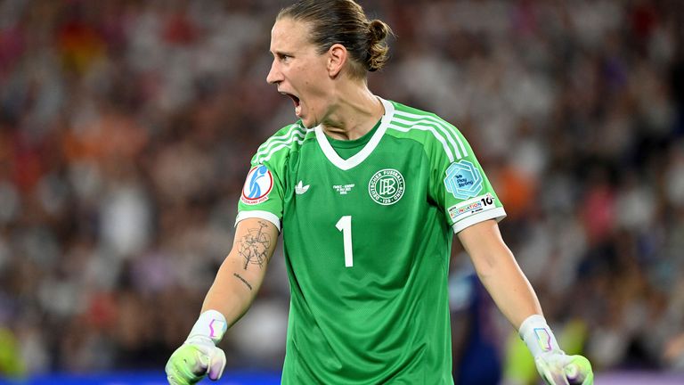 Ann-Katrin Berger celebrates after helping Germany to beat France