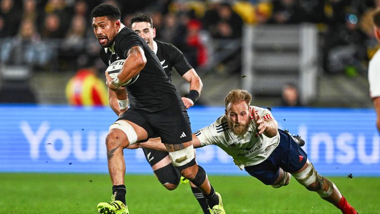 New Zealand's Ardie Savea breaks a tackle as he makes a run . (Kerry Marshall /Photosport via AP)