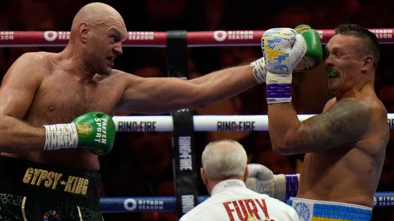 Tyson Fury punches Ukraine's Oleksandr Usyk during their undisputed heavyweight world championship fight in May 2024