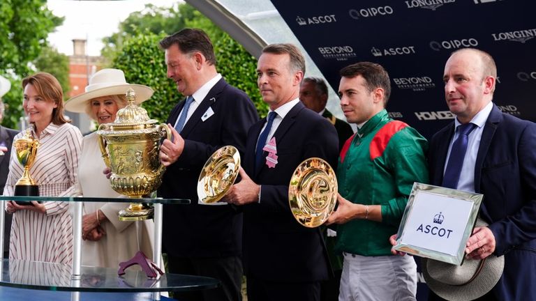 Team Calandagan take their prizes after winning the King George