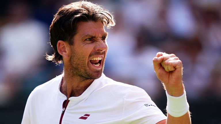 Cameron Norrie celebrates winning the second set on day five of the 2025 Wimbledon Championships at the All England Lawn Tennis and Croquet