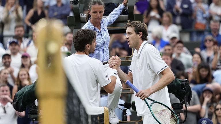 Cameron Norrie (left) and Nicolas Jarry at the net following their Gentlemen's Singles match on day seven of the 2025 Wimbledon Championship