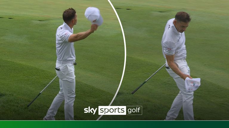  Camilo Villegas chips in for eagle then catches his ball in his cap at John Deere Classic