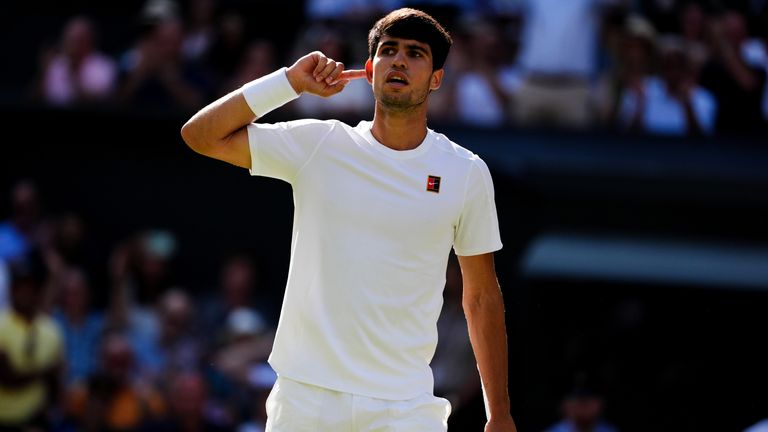 Carlos Alcaraz reacts during his Gentlemen's Singles Final against Jannik Sinner on day fourteen of the 2025 Wimbledon Championships at the 