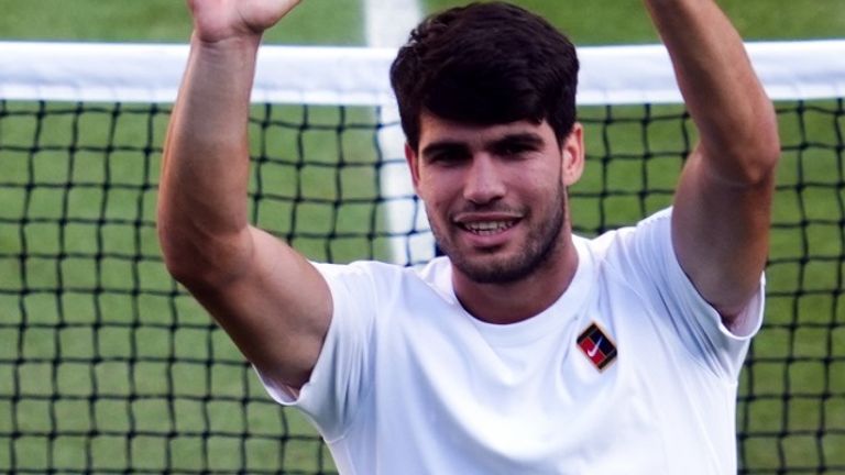 Carlos Alcaraz celebrates his Wimbledon quarter-final win against Cam Norrie