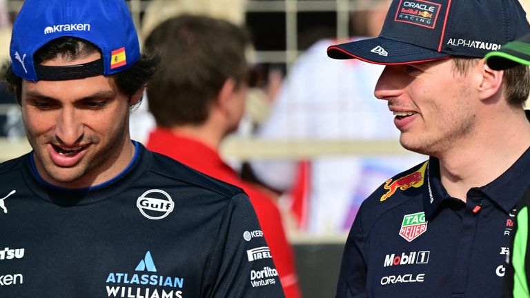 The Spanish pilot of Williams, Carlos Sainz, speaks with the Dutch pilot of Red Bull Racing Max Verstappen 
