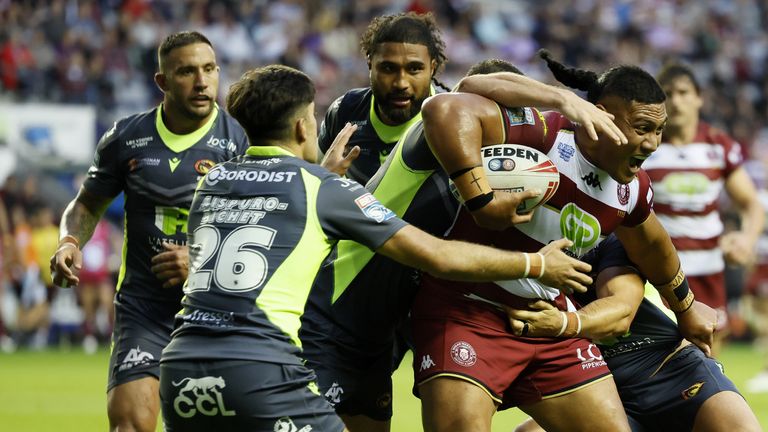 Catalans in action against Wigan in Super League 