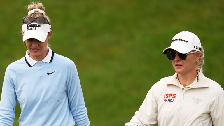 Nelly Korda talks to Charley Hull, of England, on the way to the 18th hole during the second round of the U.S. Women's Open golf tournament at Erin Hills Friday, May 30, 2025, in Erin, Wis. (AP Photo/Jeff Roberson)