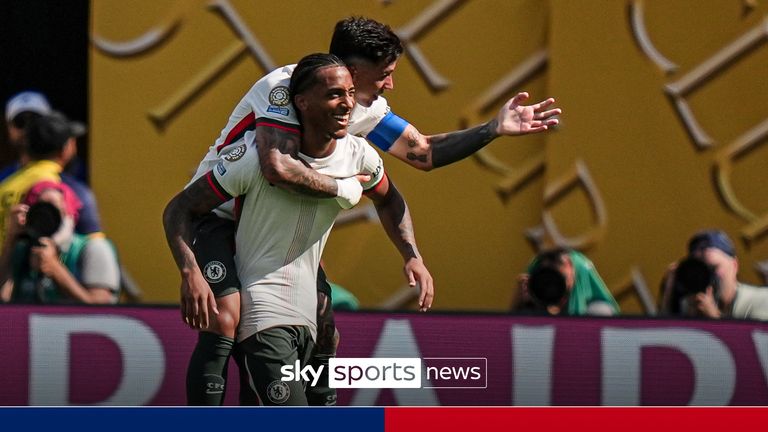 Chelsea's João Pedro, left, and Enzo Fernandez (8) celebrate after Pedro scored his side's second goal during the Club World Cup semifinal soccer match between Fluminense and Chelsea in East Rutherford, N.J., Tuesday, July 8, 2025.