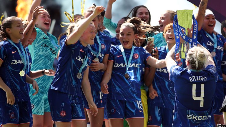 Chelsea Women celebrate winning the WSL title with a trophy lift at Stamford Bridge