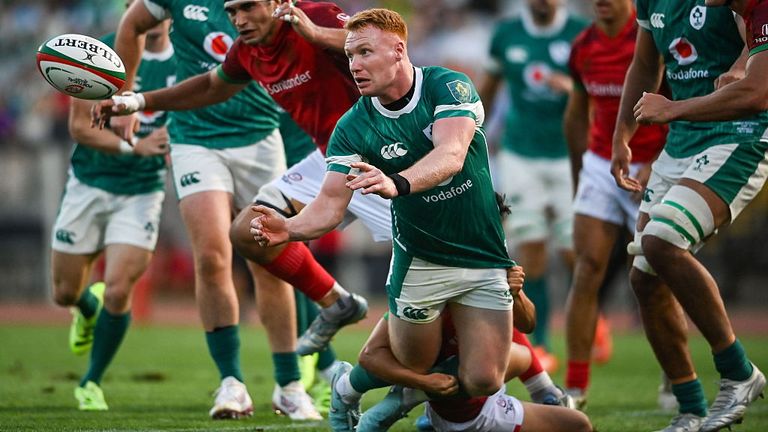 Ciaran Frawley of Ireland is tackled by Nuno Sousa Guedes of Portugal during the International Rugby Test match